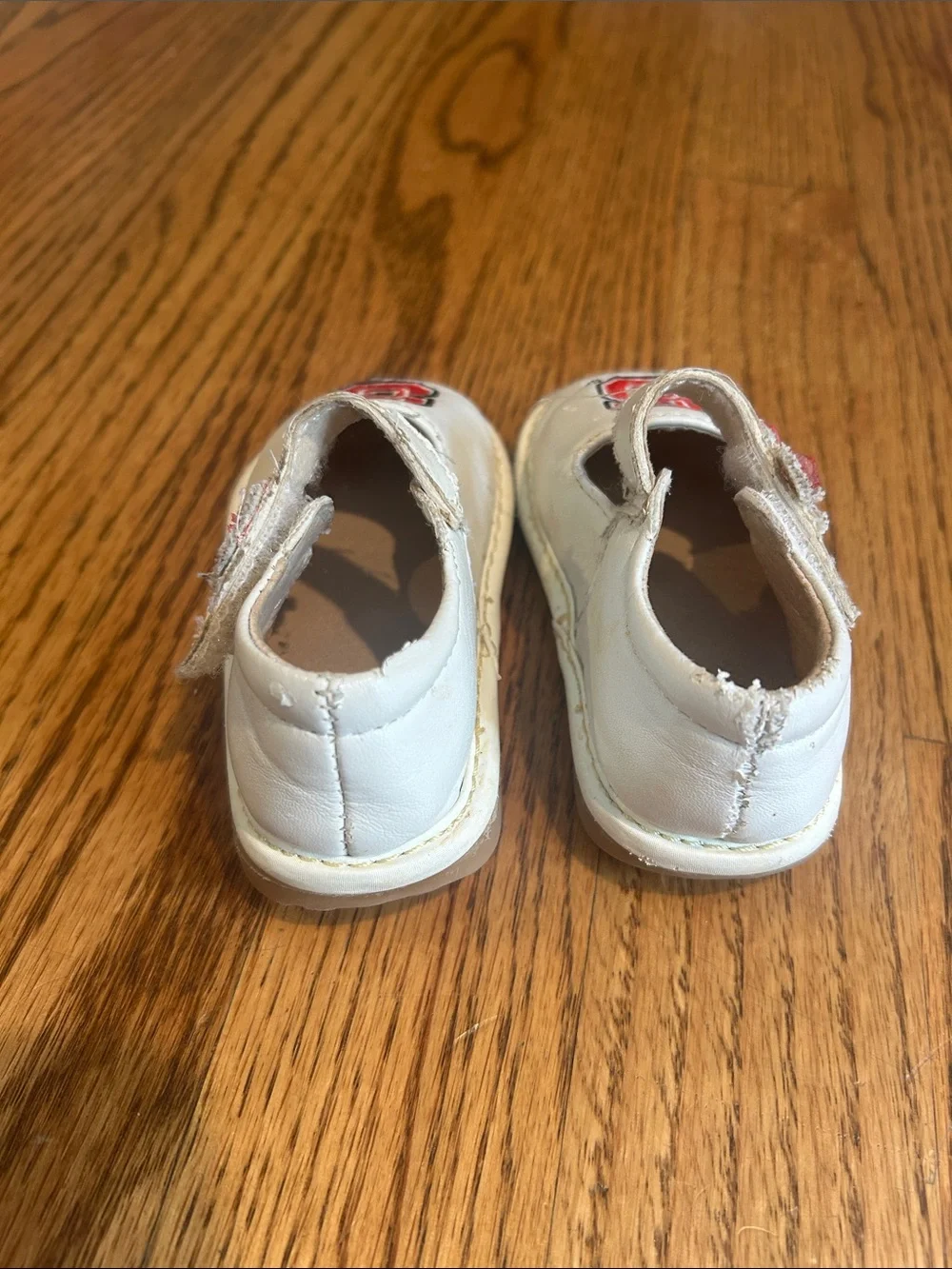 Team Squeaks Kids White Mary Jane Shoes with Red NC State Logo
